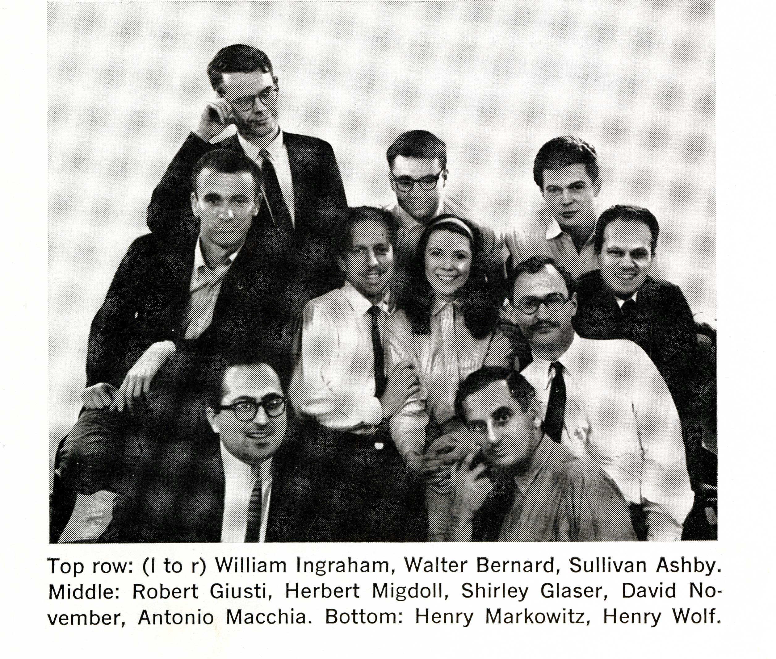 black and white photo of mostly men and one woman